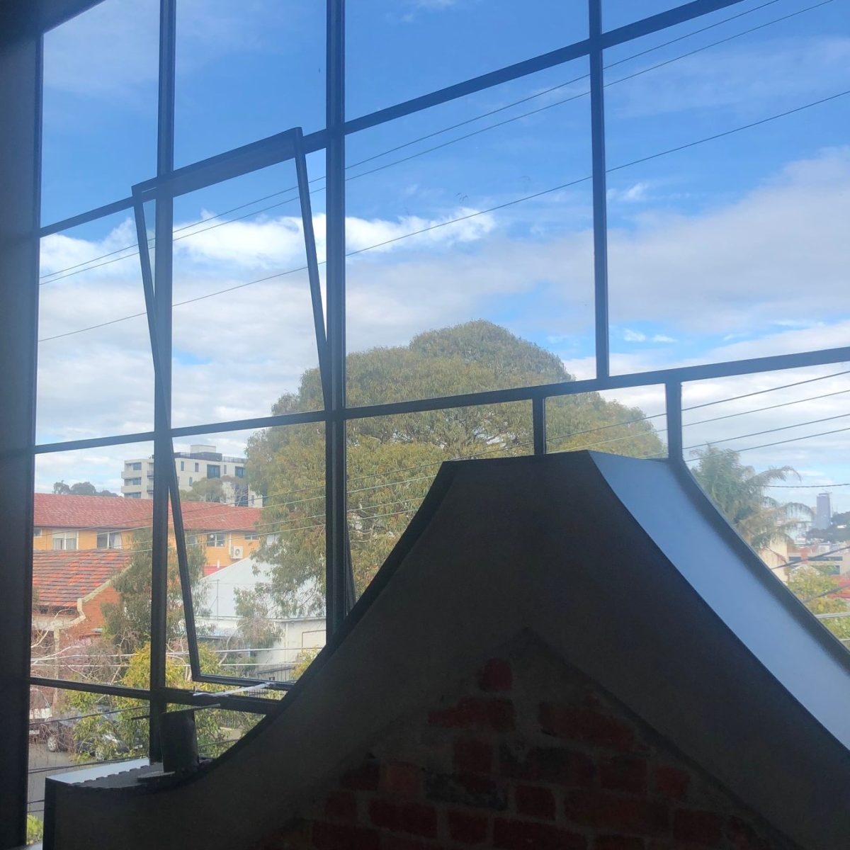 Union St House Original facade surrounded with windows and view over Brunswick